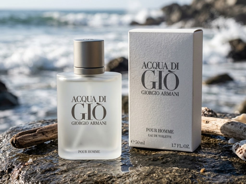 Giorgio Armani Acqua Di Giò Eau De Toilette 50ml bottle and light-gray box on a wet seaside rock with natural coastal ocean bokeh.